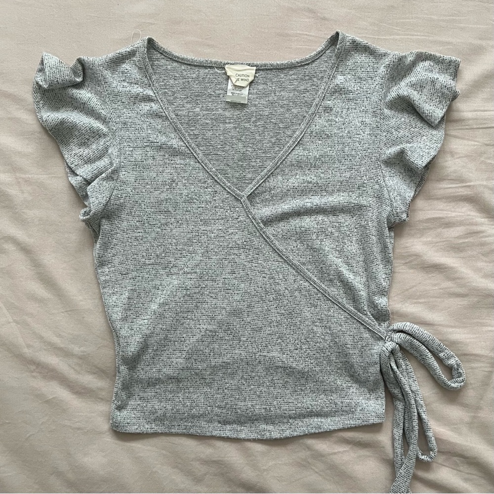 CAUTION TO THE WIND Ruffled Sleeve Wrap Top